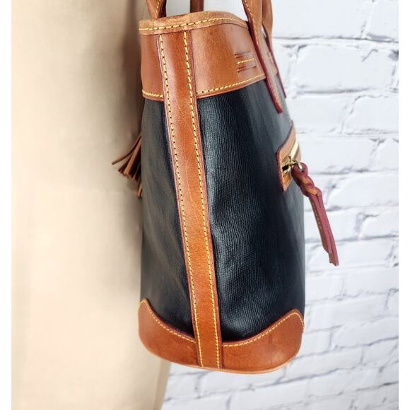 Dooney & Bourke Saffiano Tassel Bucket Tote Bag in black with tan trim - Picture 3 of 16